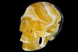 Realistic, Polished, Banded Orange Calcite Skull - Fluorescent! #116432-1